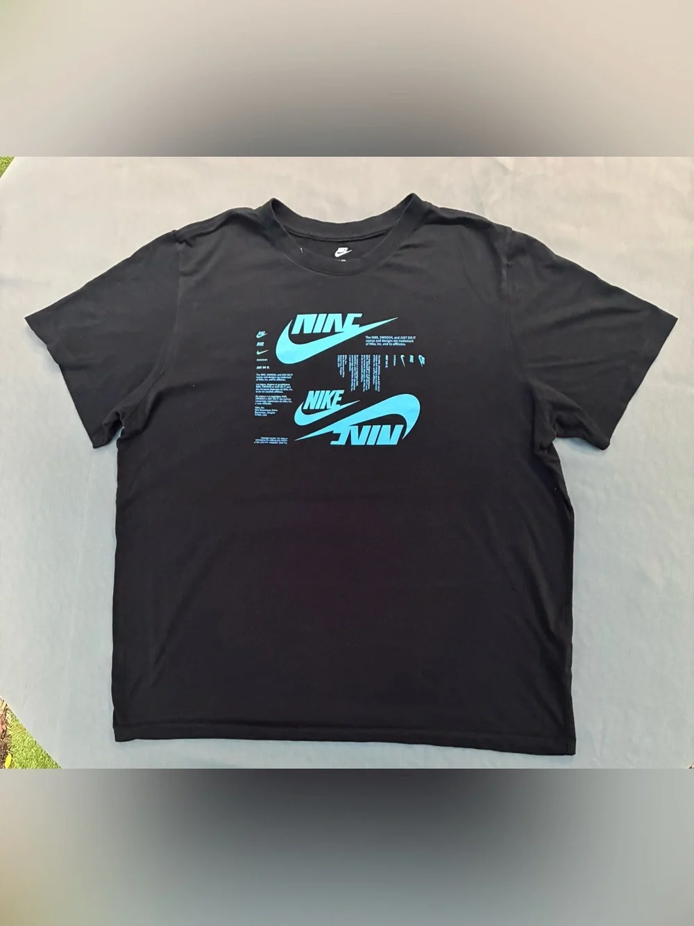 Nike Black Short Sleeve Tee with Teal Graphic